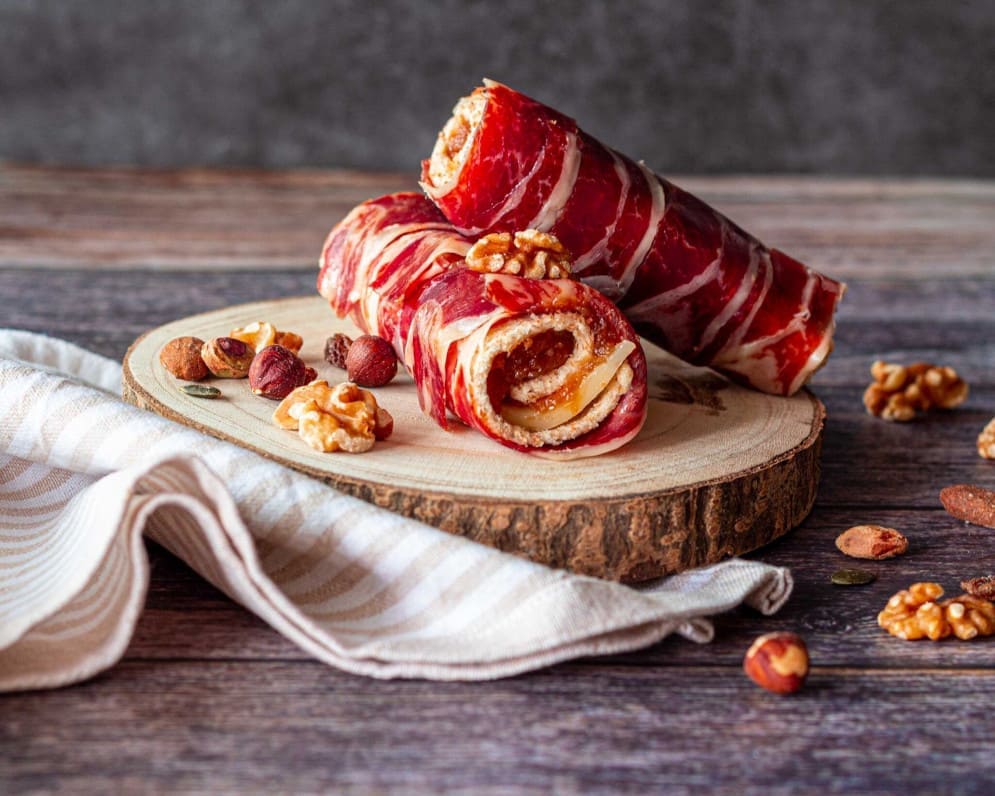 Rollito de membrillo, jamón ibérico y queso