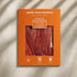 Sobre de Jamón Gran Reserva (jamón serrano) Enrique Tomás loncheado (sobre al vacío) fondo piedra